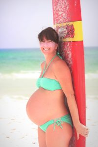 Randy took this shot of Heather at 41+ weeks pregnant getting ready to knee-paddle out into the surf.