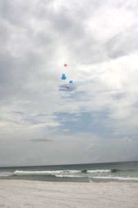 Nora's balloon pulling away.